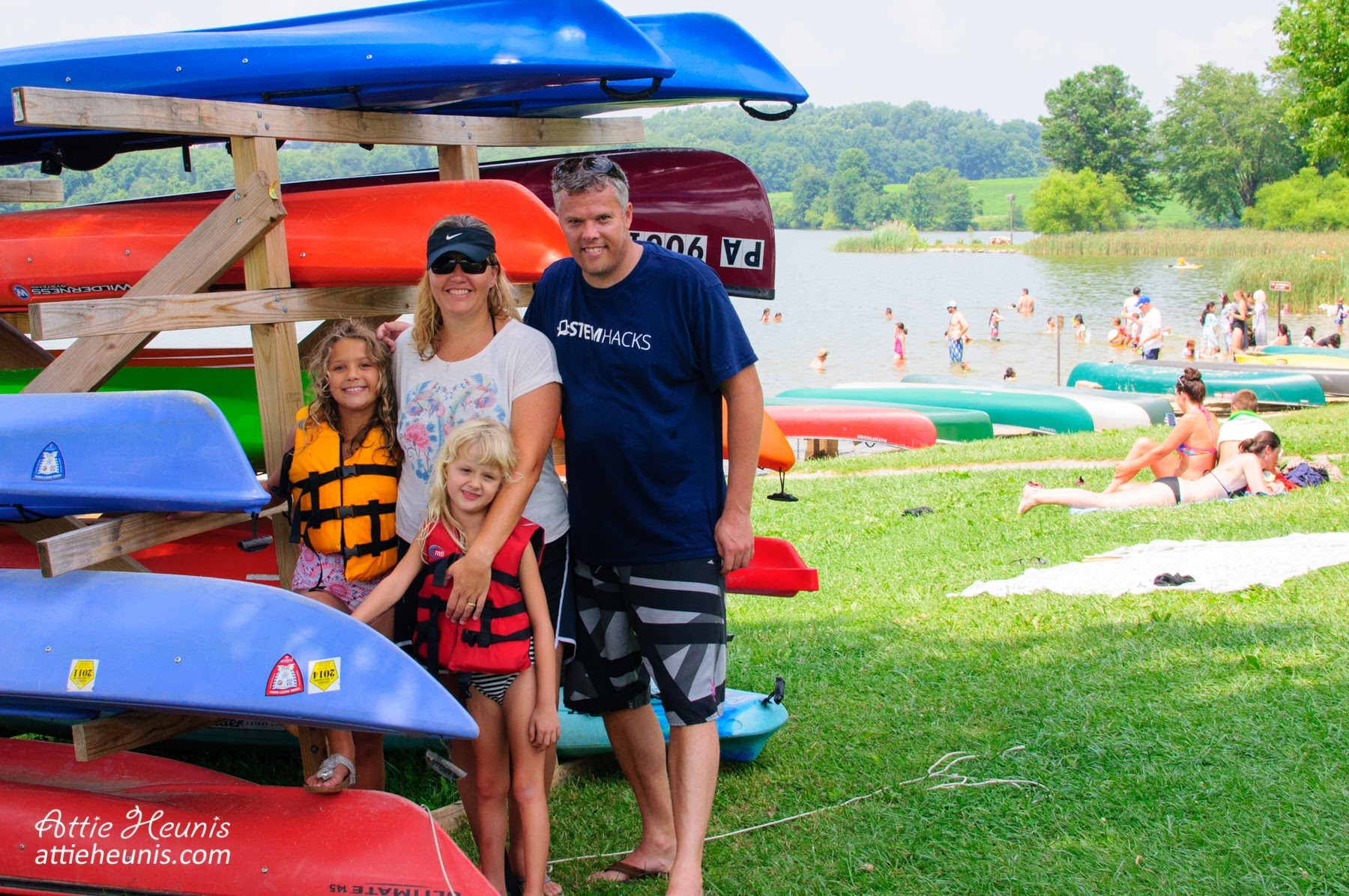 Heunis family at Marsh Creek with colorful canoes.